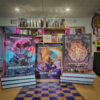 dmg01 Dungeons & Dragons Dungeon Master’s Guide 2024 and Player’s Handbook displayed in a gaming shop with vibrant cover art.