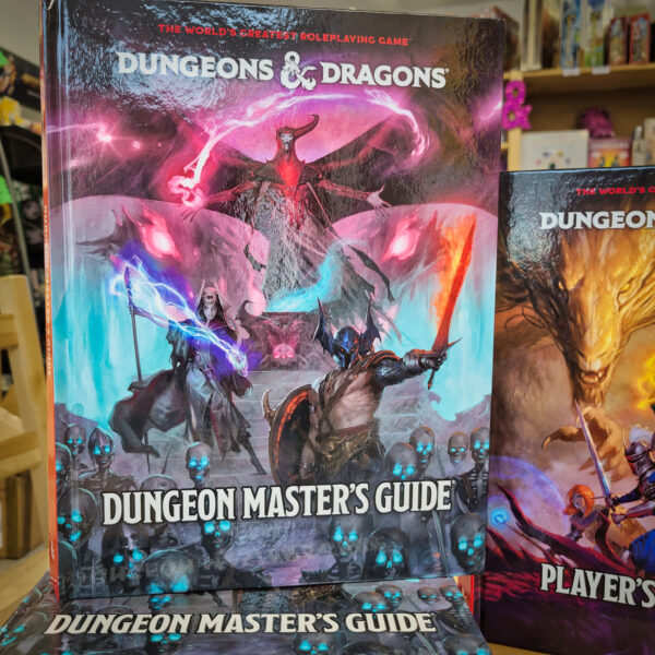 dmg02 Close-up of the Dungeons & Dragons Dungeon Master’s Guide 2024 standard cover featuring epic fantasy artwork with spellcasters and glowing weapons.